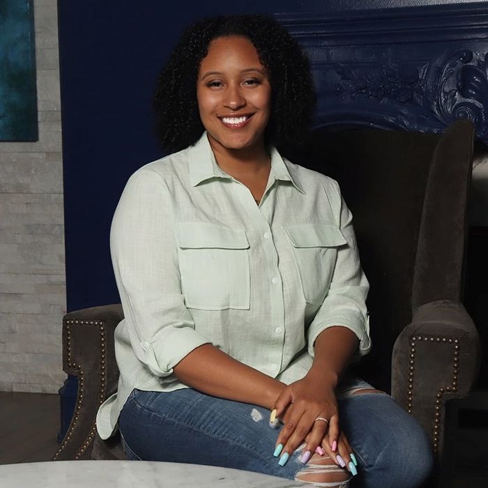 a reviewer styling the button-up with jeans
