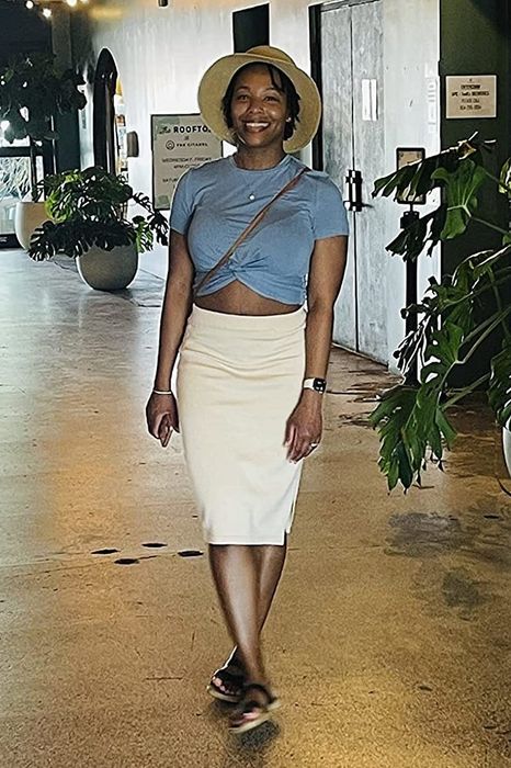 Reviewer wearing the blue crop top