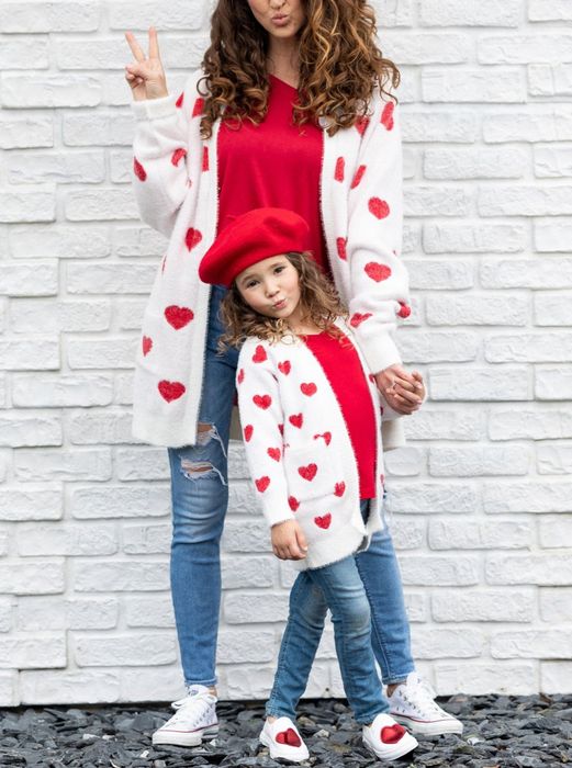 Photo of models wearing white cardigans