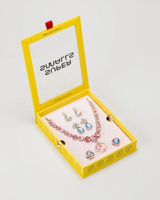 the jewelry set includes rings, earrings, and a necklace