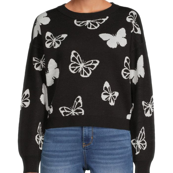 Photo of a model sporting a black sweater