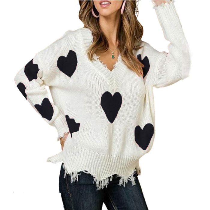 Image of model wearing a white sweater