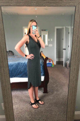 A reviewer in a gray version of the dress