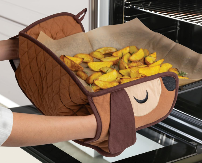 A long oven mitt with two hand pockets, designed to resemble a sleeping dachshund with floppy ears