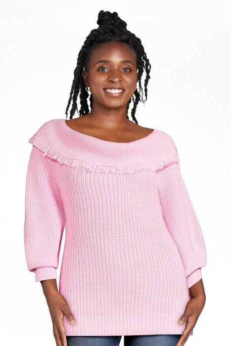 Photo of model wearing a pink sweater