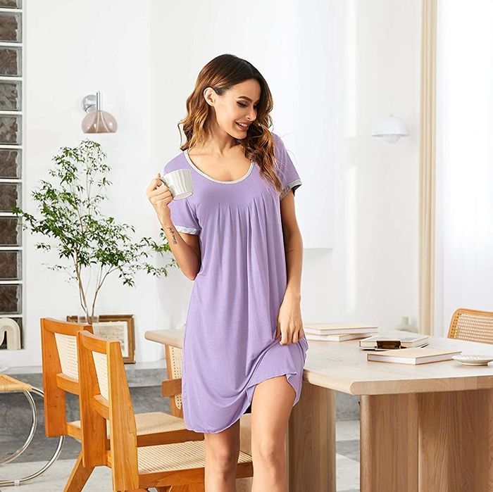 Model wearing a purple nightgown.