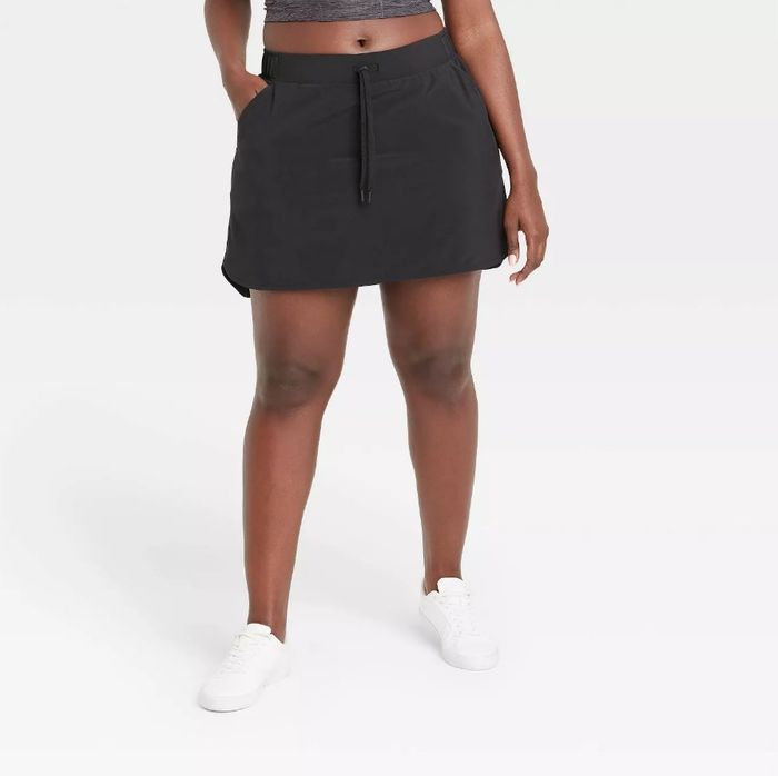 A model is rocking the skort in black.