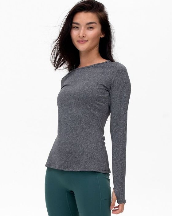 a model wearing the shirt in heather gray