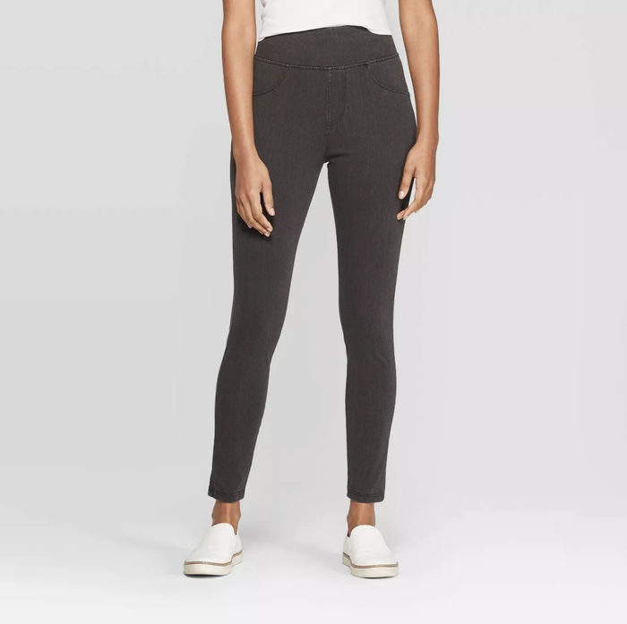 A model sports the jeggings in a sleek gray color.