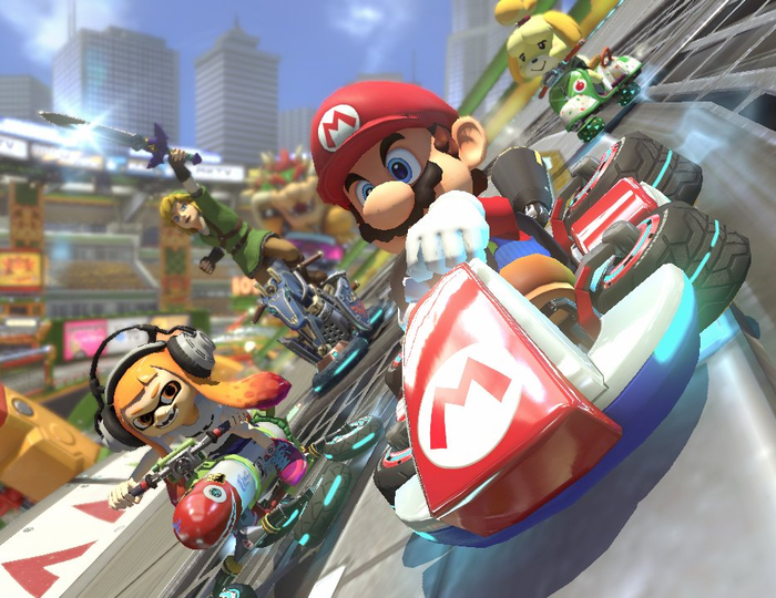 several characters, including Mario, racing down a track in Mario Kart 8 Deluxe
