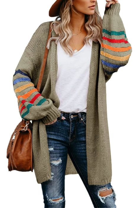 Photo of model wearing a green sweater