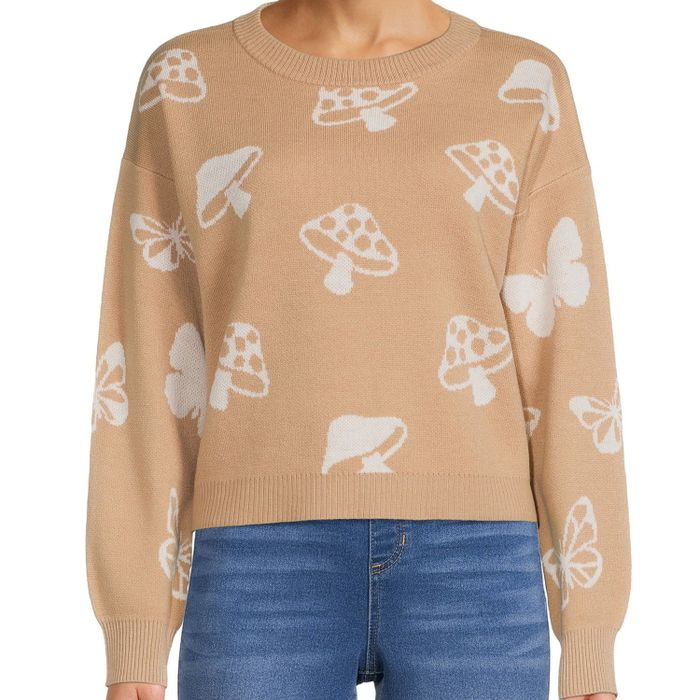 Photo of a model wearing a tan sweater