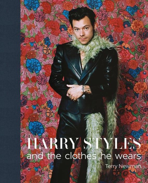 A floral-covered book featuring Harry Styles on the cover.