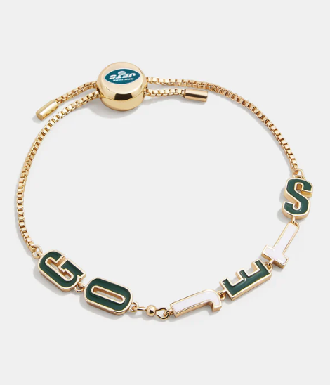 A gold chain bracelet featuring green and white letters that say