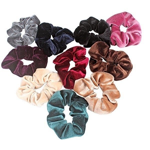 A collection of velvet scrunchies in various colors, offering both style and comfort.