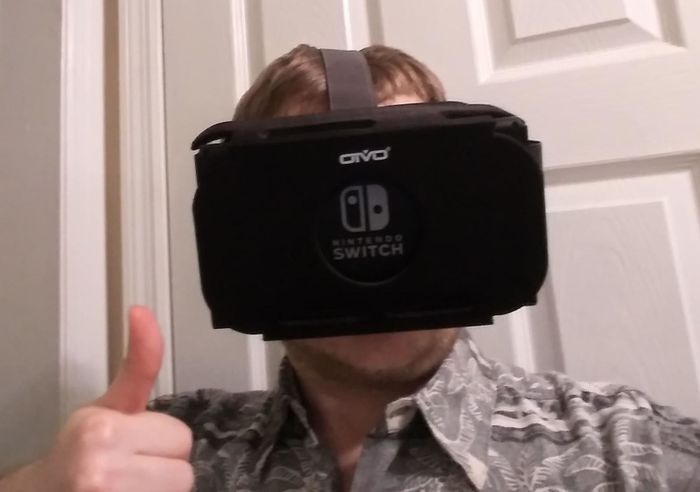 A man is seen enjoying his game while wearing the VR headset, ready to explore virtual worlds.