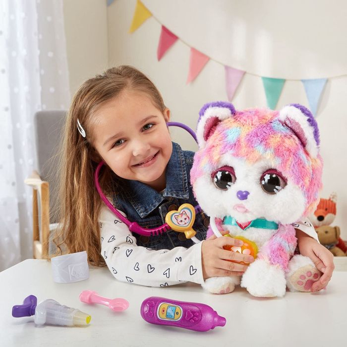 a child caring for the healing husky, listening to its heart with a stethoscope