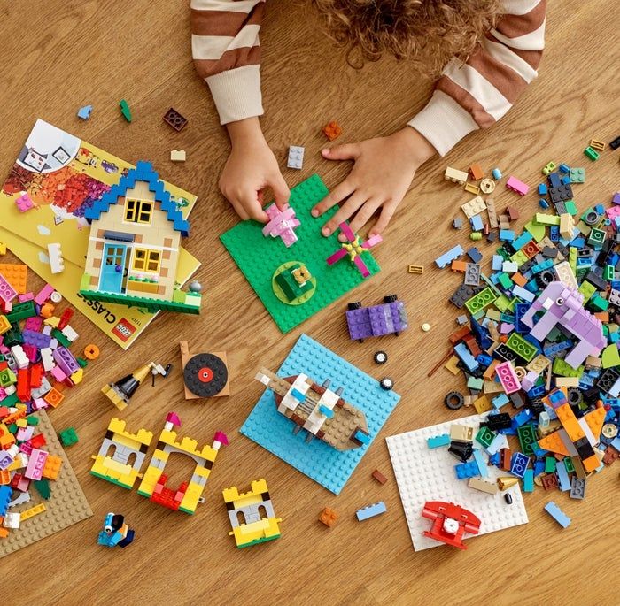 The 1500+ piece LEGO classic set in action, constructing various structures