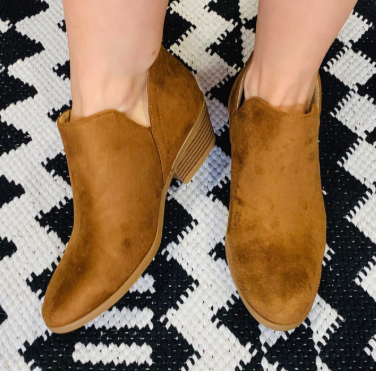 Tan suede booties that blend style and comfort effortlessly.