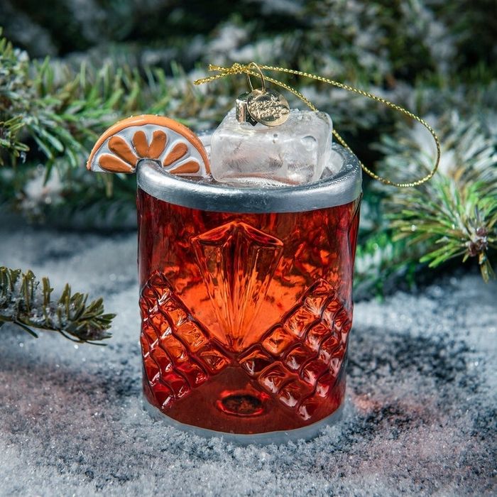 A beautifully crafted hand-blown glass ornament inspired by the Negroni cocktail.