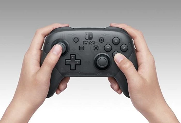 A sleek black game controller.