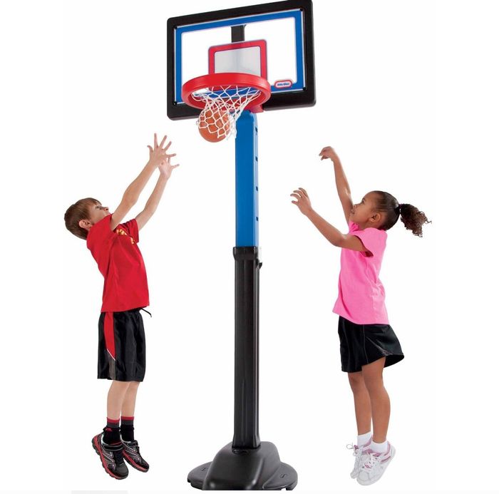 The basketball set in action with a boy and girl enjoying their game.