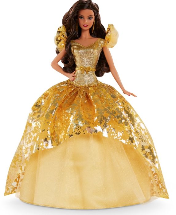 The 2020 Holiday Barbie dressed in a stunning gold gown