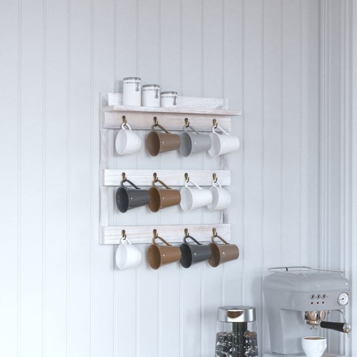A mug rack with numerous mugs hanging from it.