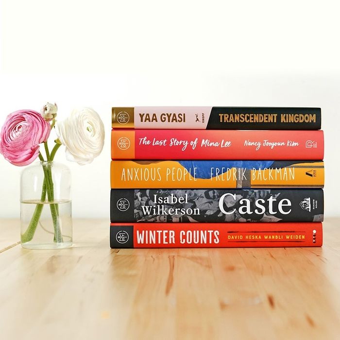 A stack of carefully selected books, ready to take them on a new adventure outside of school assignments.