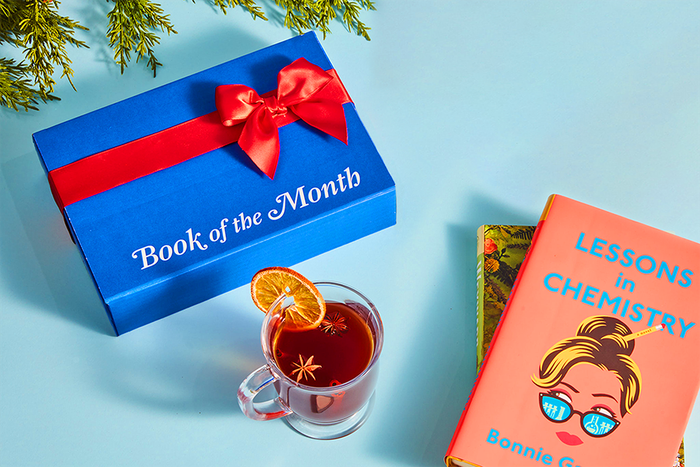 A Book of the Month box wrapped up neatly, with a copy of *Lessons in Chemistry* placed beside it.