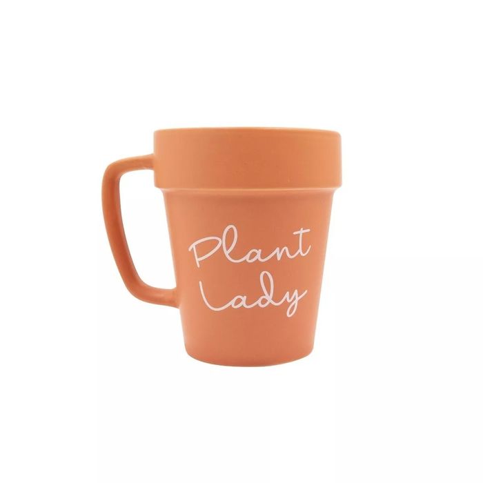 A terracotta mug shaped like a plant pot with 'Plant Lady' written on it, perfect for plant lovers and gardeners.