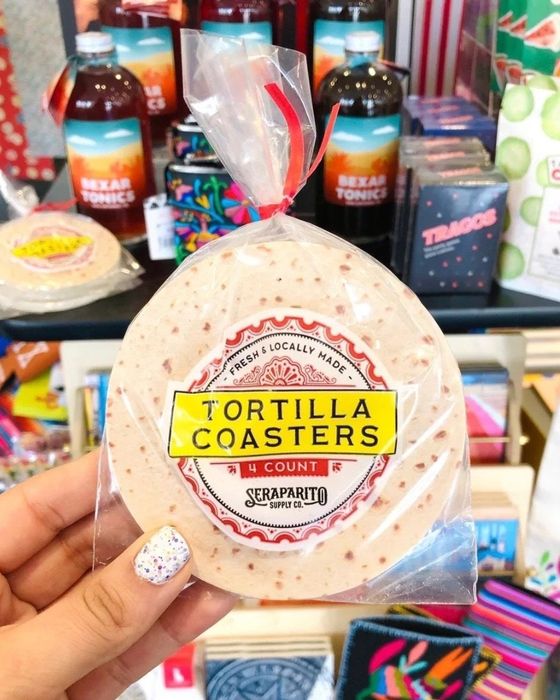 A packet of tortilla coasters, wrapped in plastic like a real pack of tortillas