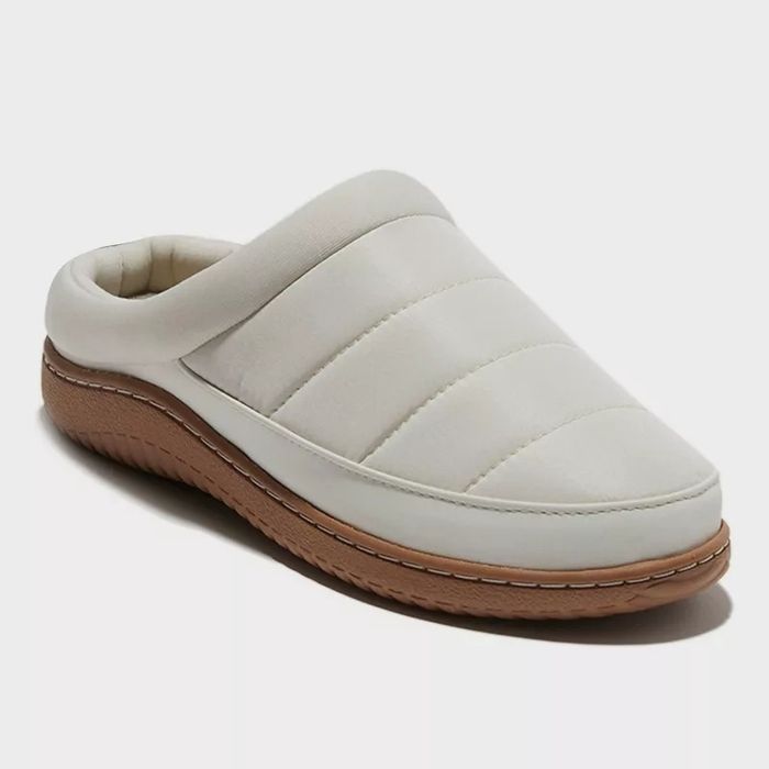 Comfortable slip-on slippers with a cushioned design and textured sole, perfect for casual wear and quick errands.