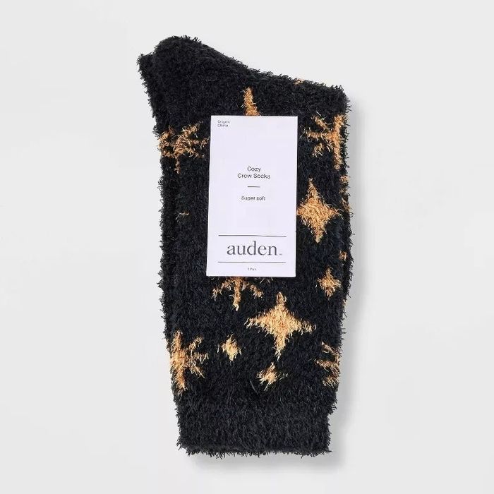 A pair of ultra-soft crew socks featuring star patterns, designed by Auden for maximum comfort.