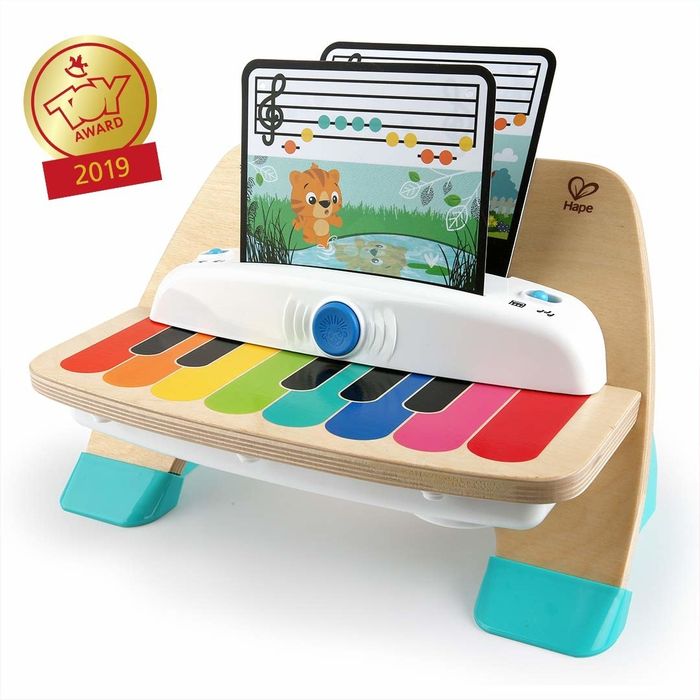The wooden toy piano.