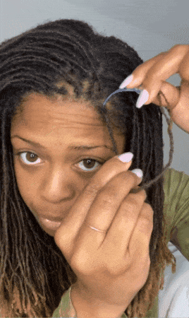 A reviewer demonstrating how to properly use the interlocking tool