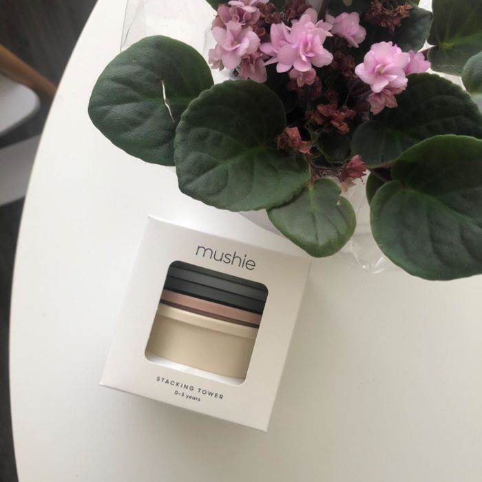 A reviewer’s photo showing the stacking cups in their packaging.