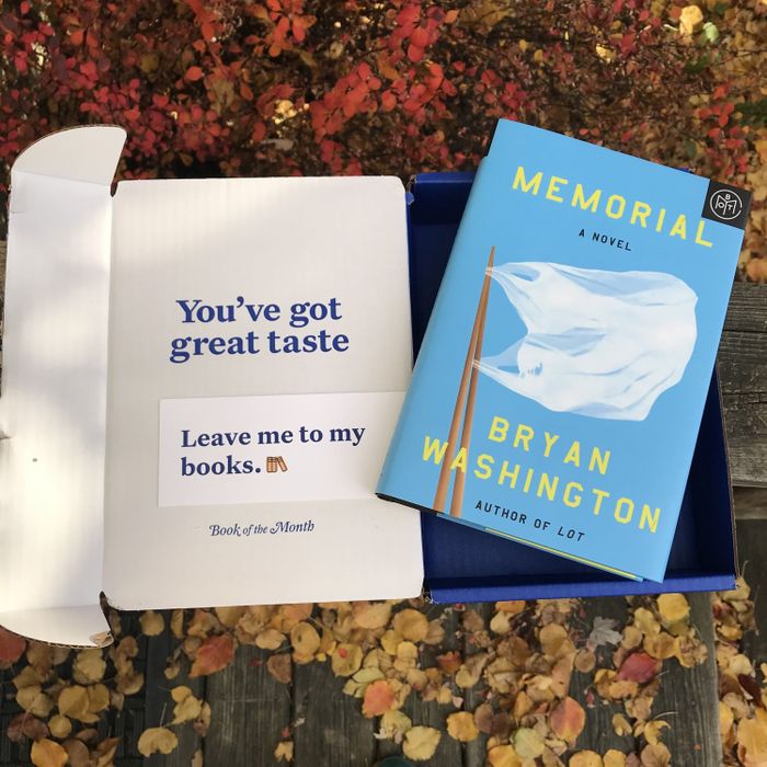 A Book of the Month box with a bookmark and 'Memorial' by Brian Washington.