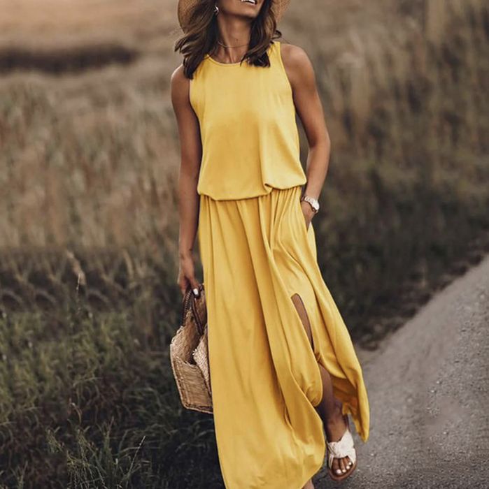 A yellow sleeveless dress on display
