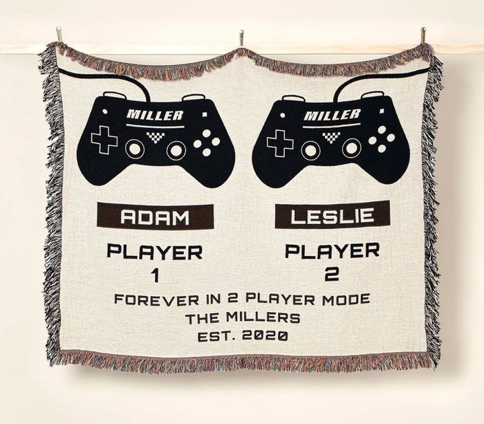 Personalized throw blanket with game controller graphics, labeled