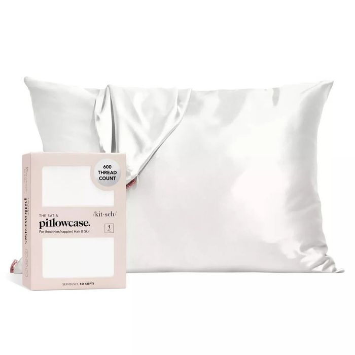 The satin pillowcase along with its elegant packaging.