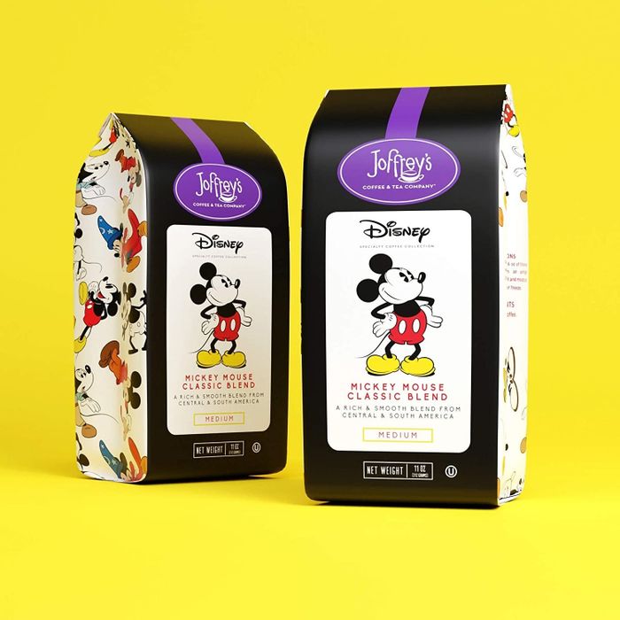 Two bags of coffee featuring a charming Mickey Mouse on the packaging