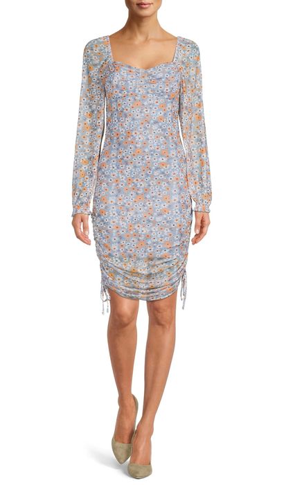 the dress in blue with orange and white flowers