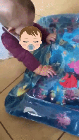 A reviewer's video of their child having fun with the inflatable water mat.