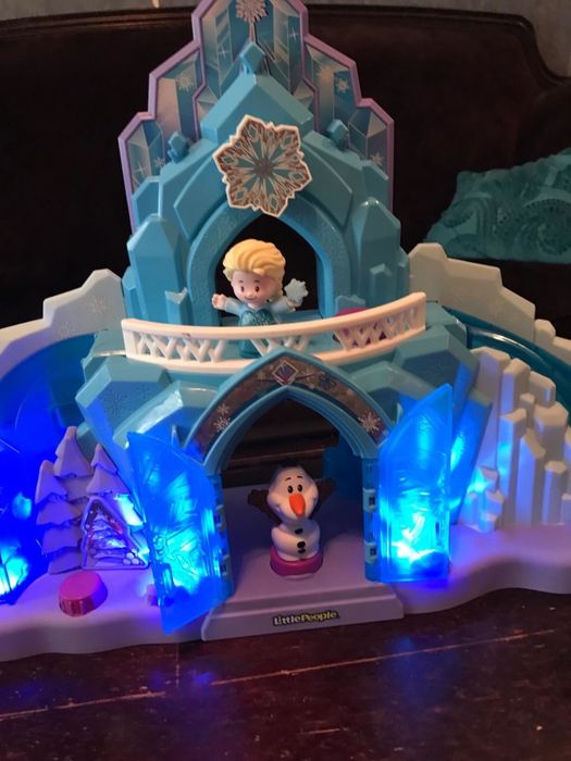Reviewer's photo showing the castle illuminated.