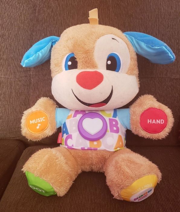 A reviewer's photo of the playful Puppy toy.