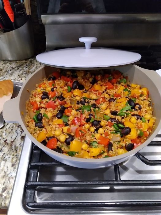 A reviewer’s Spanish rice cooked in the lavender-colored pan