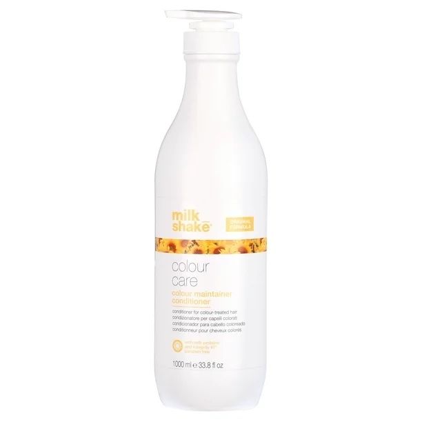 A white and yellow bottle of hair conditioner