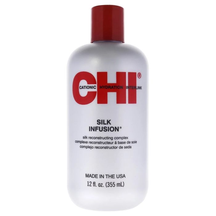 A grey and red bottle of hair product