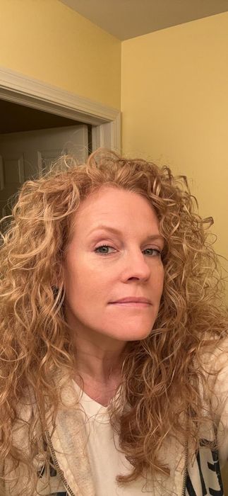 Reviewer's curls after using the spray
